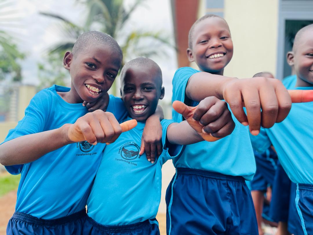 Happy children in blue uniforms